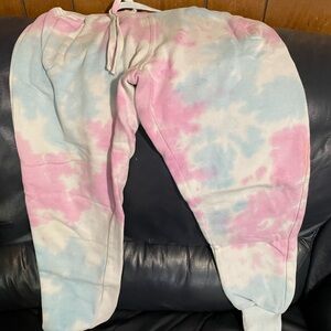 Pink and baby blue tie dye sweat pants with pockets. Size medium